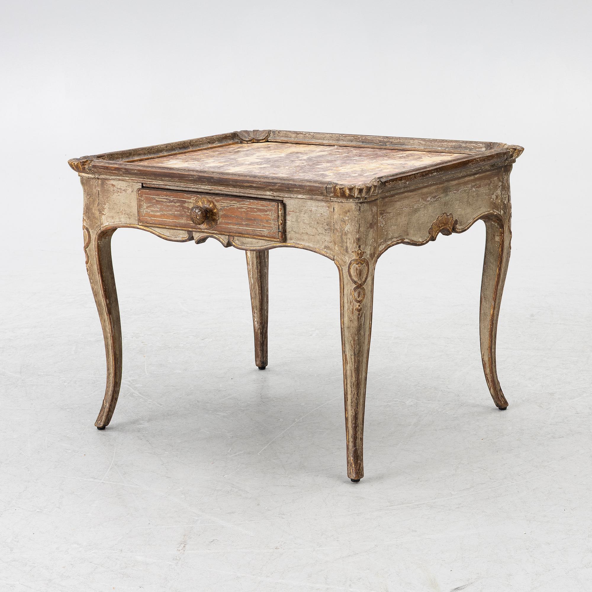 A Rococo table, 18th century.