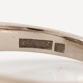 Ring in 18K white gold set with round brilliant-cut and eight-cut diamonds.