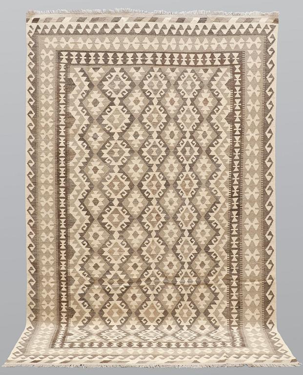 A carpet, Kilim, ca 305 x 198 cm.