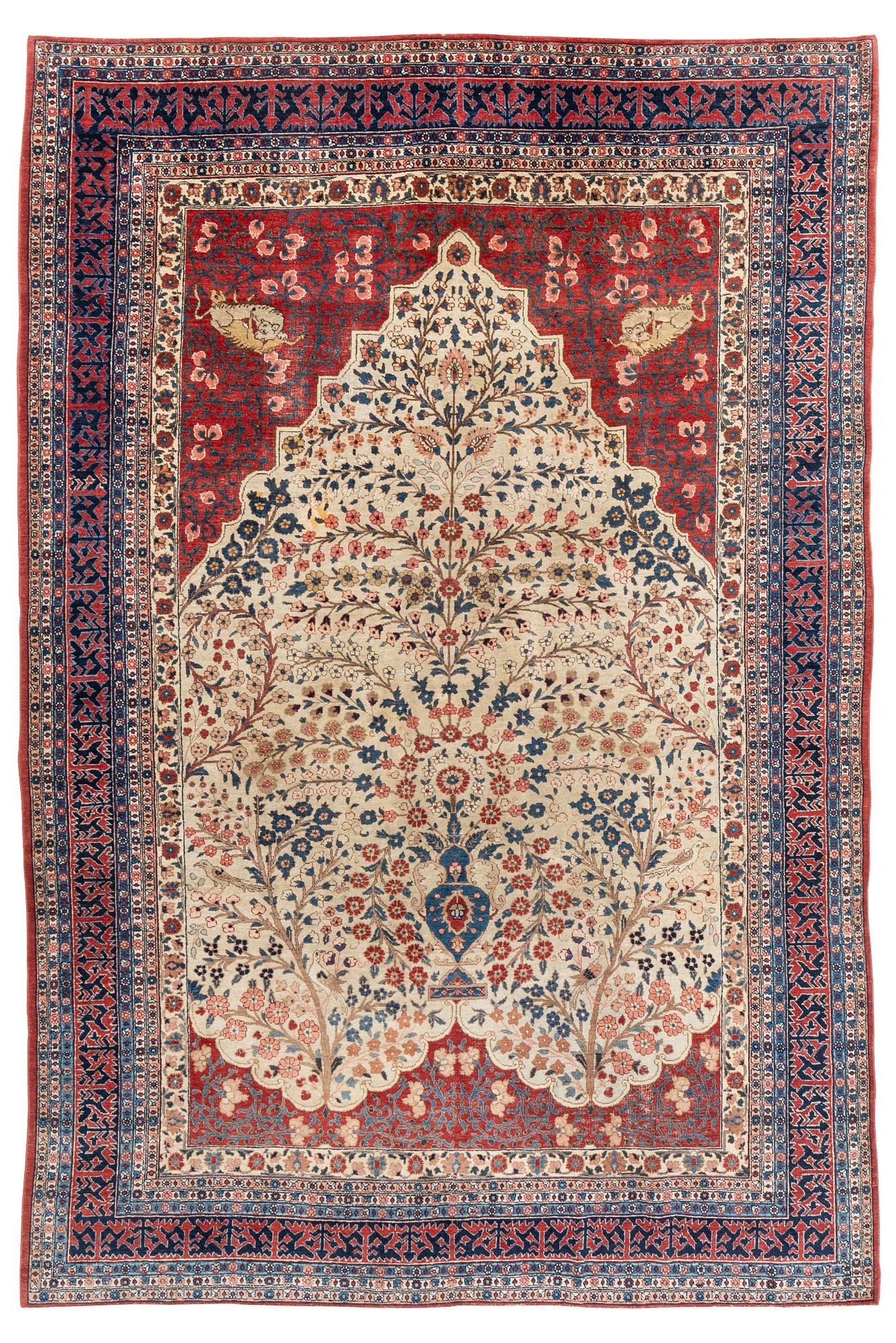 An antique Tabriz carpet, ca 333 x 223 cm.