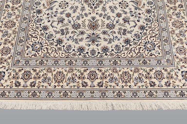 A carpet, Nain part silk s.k 6 LAA, 238 x 148 cm.