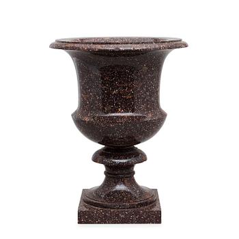 562. A Swedish Empire 19th century porphyry urn.