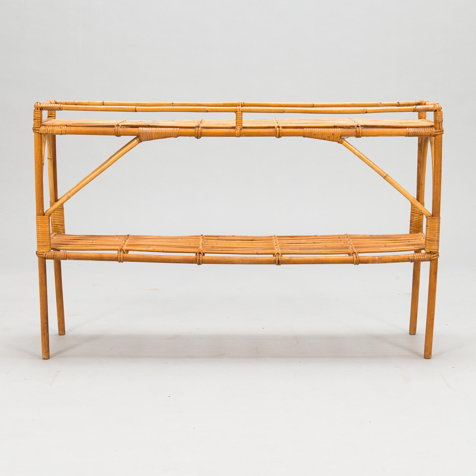 A mid 20th century rattan flower table.