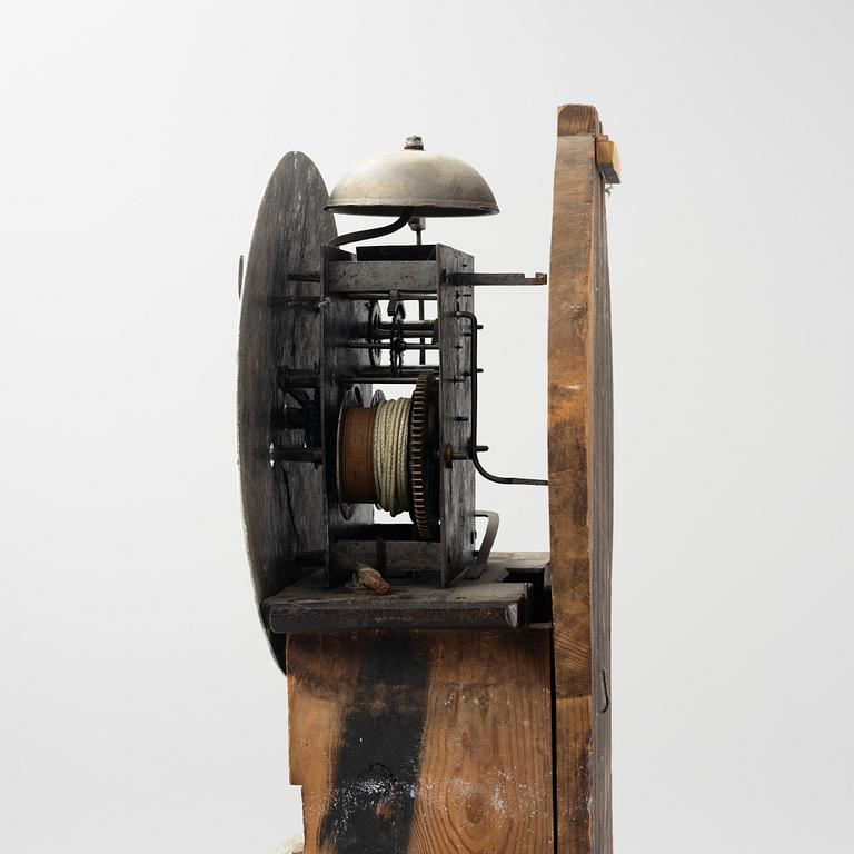 A longcase clock, 19th century.