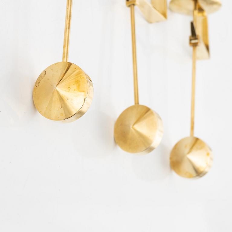 Pierre Forssell, a set of five brass 'Pendeln' wall lights from Skultuna, late 20th Century.
