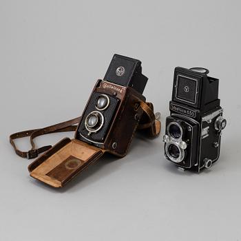 Two Twin Lens Reflex Cameras, a 1950s /60s Yashica 635 and a 1930s Rolleicord.