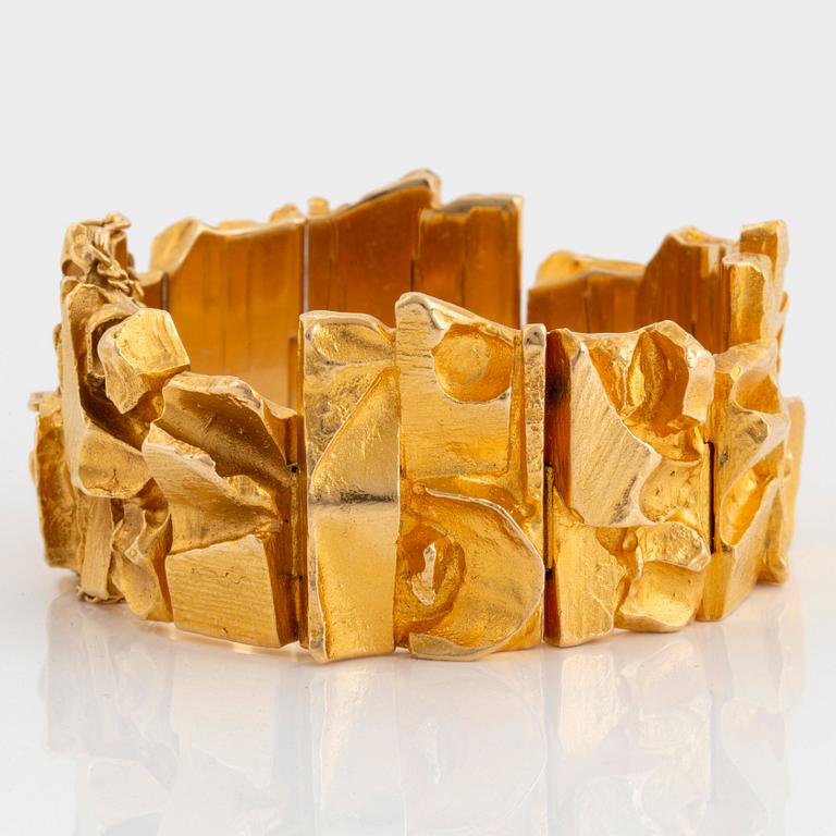 An 18K gold bracelet designed by Björn Weckström for Lapponia.