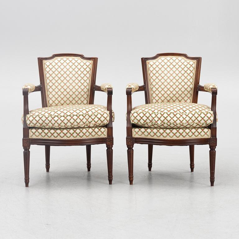 A Pair of Louis XVI Style Armchairs, 20th Century.