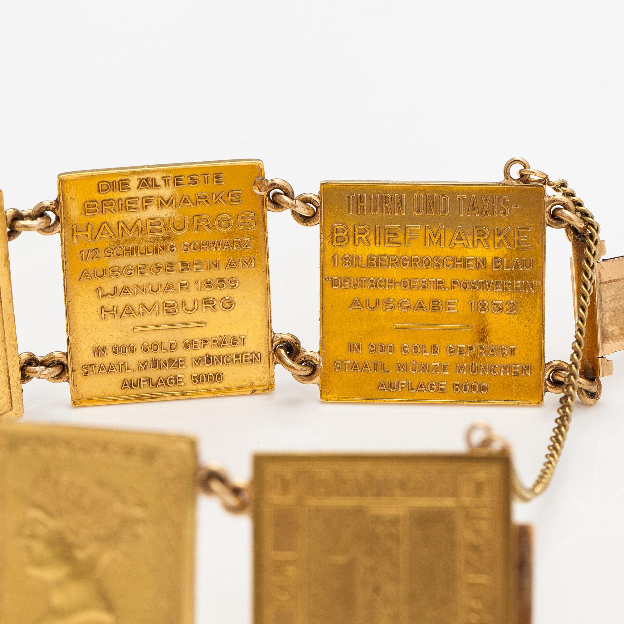 A bracelet with post stamps made of 900 gold..