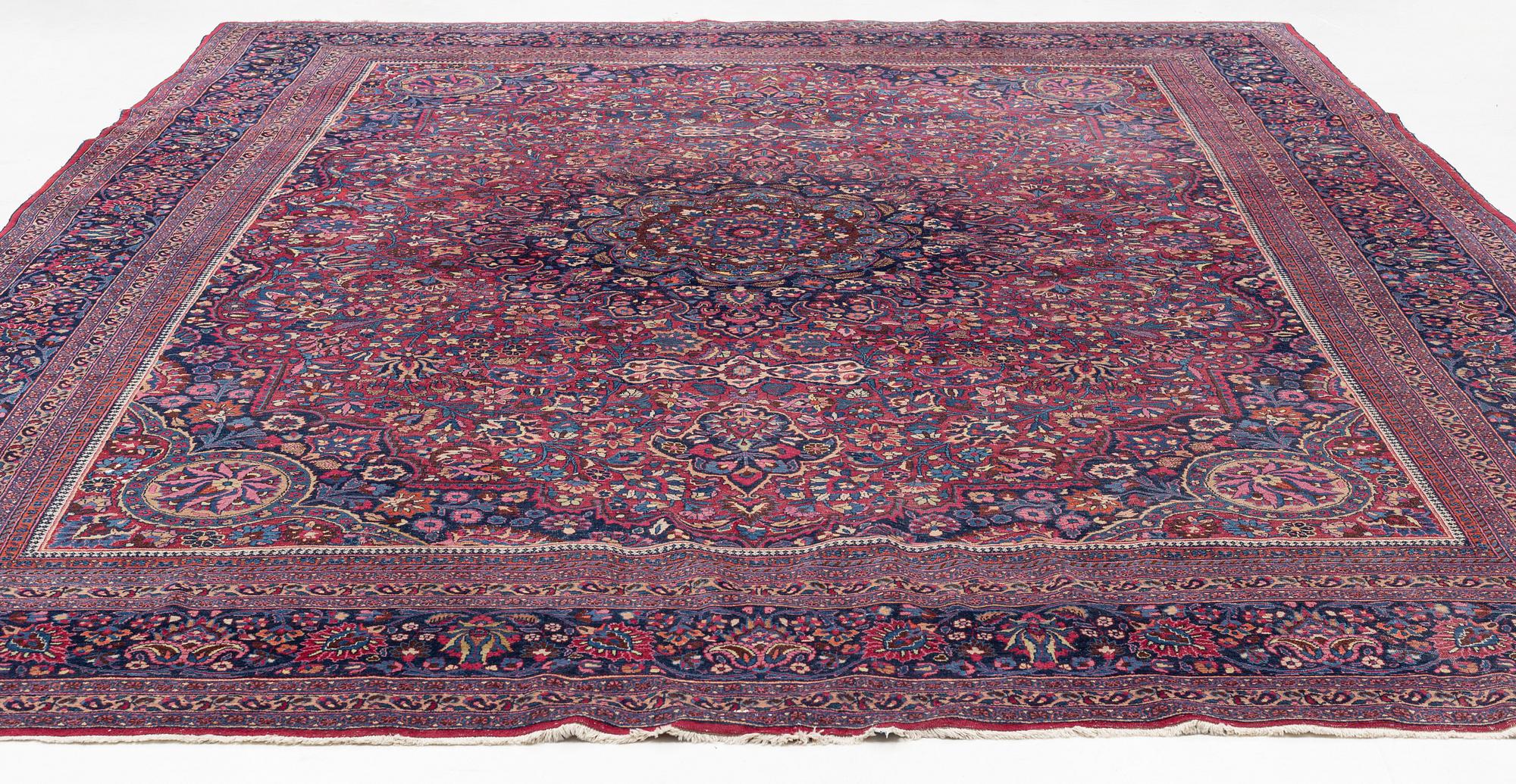 A Meshed carpet, c. 405 x 320 cm.
