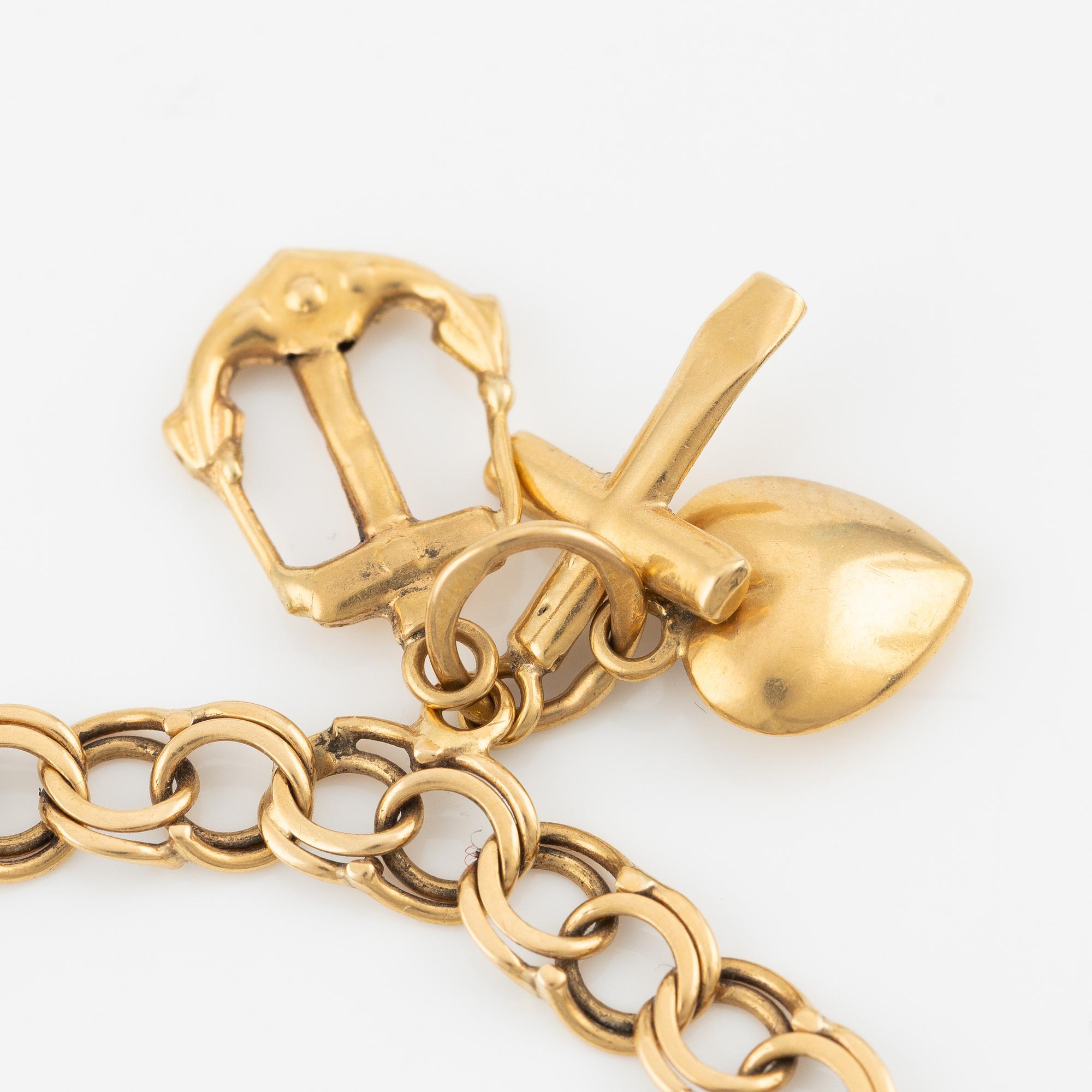 Armband, 18K guld, med berlocker.