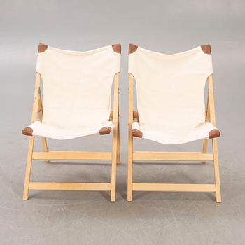 A pair of folding chairs from IKEA around 2000.