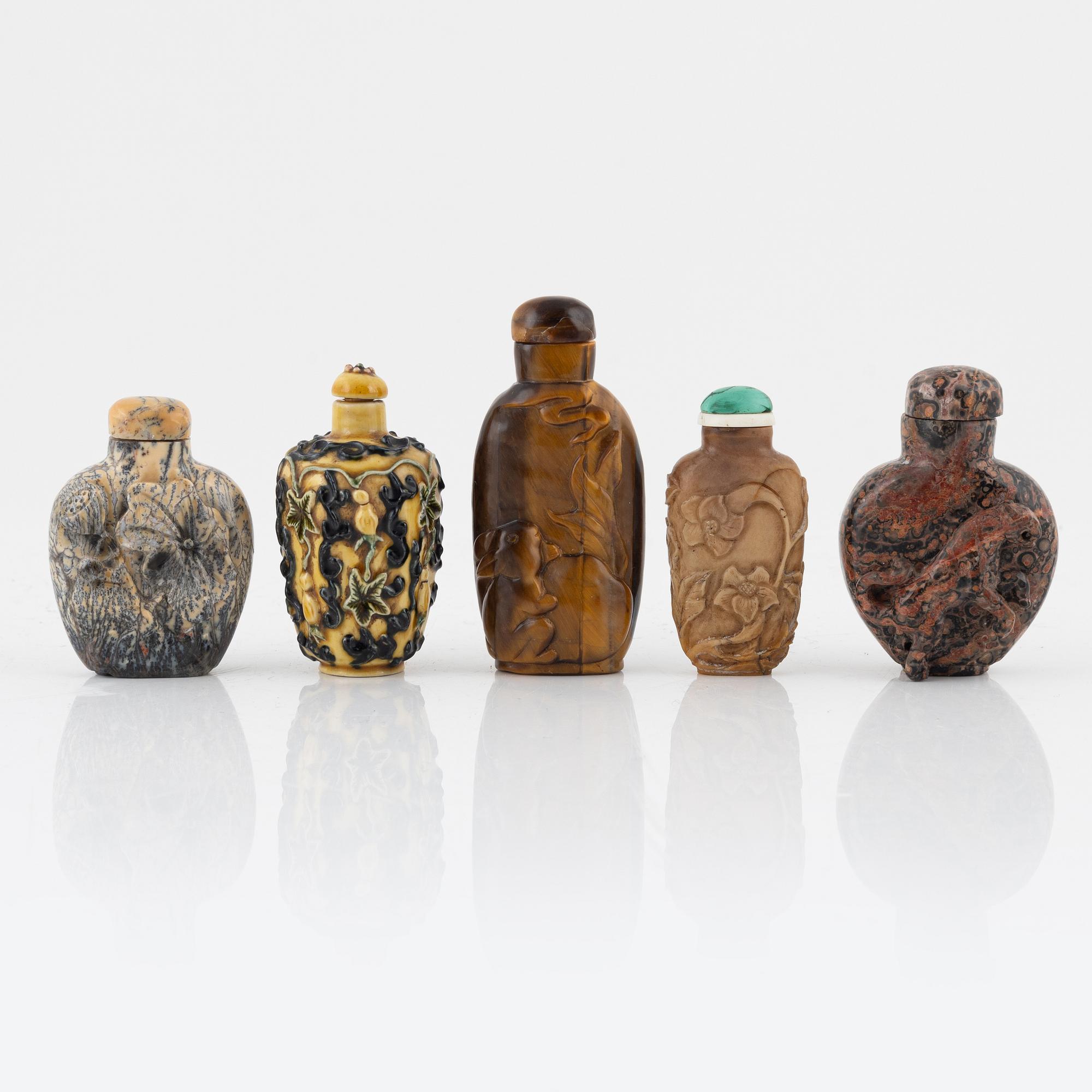Ten snuff bottles, mottled stone, China, 20th century.