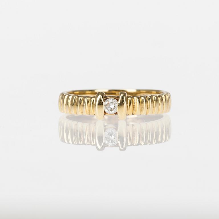 ARMRING och RING, 14/18K guld, briljantslipad diamant ca 0,15 ct. Vikt tot. 12,2 g.