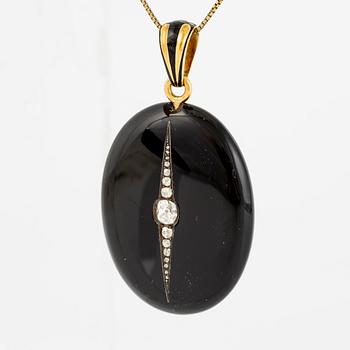 Medallion, 18K gold, onyx, black enamel, and old-cut diamonds, late 19th century.