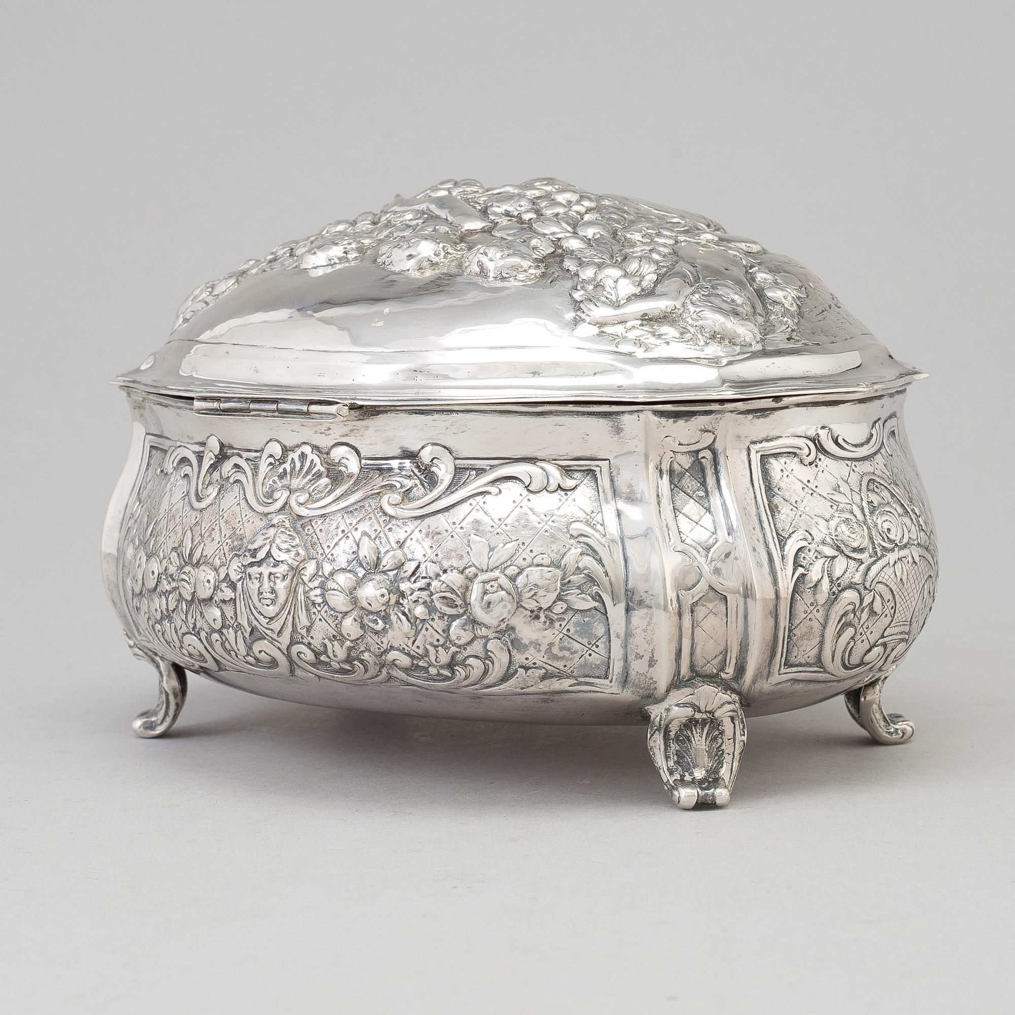 A silver sugar box, early 20th century.