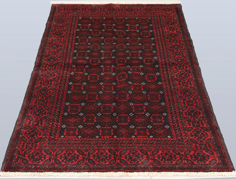 A Beluch rug, c. 203 x 117 cm.