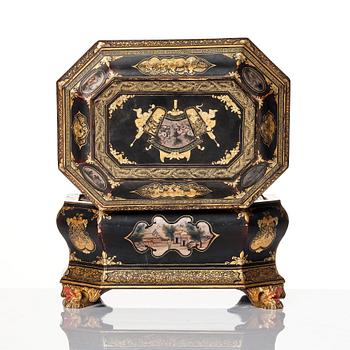 A Chinese lacquered tea caddy with pewter boxes, Qing dynasty, 19th Century.