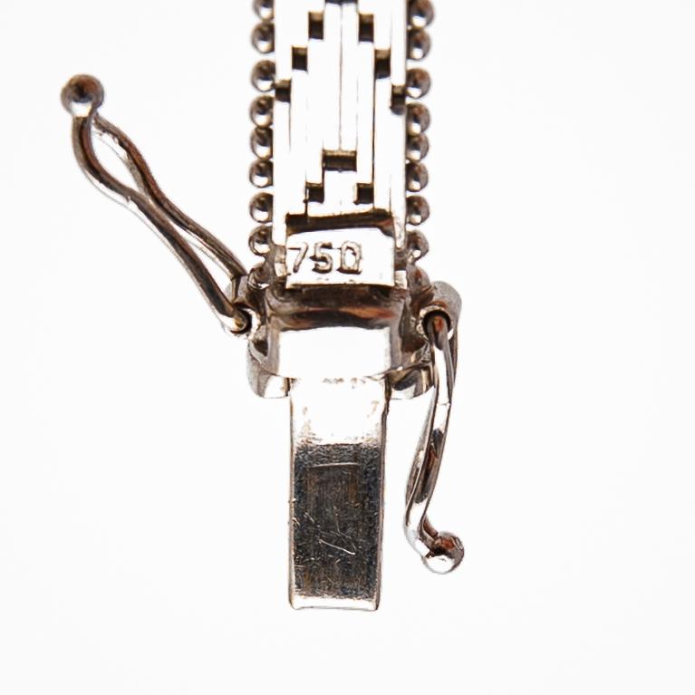 Bracelet, 18K white gold with cabochon-cut and brilliant-cut diamonds.