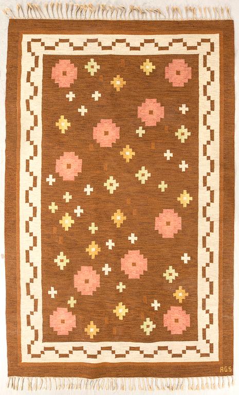 Anna-Greta Sjöqvist, a signed flat weave carpet approx 309x197 cm.
