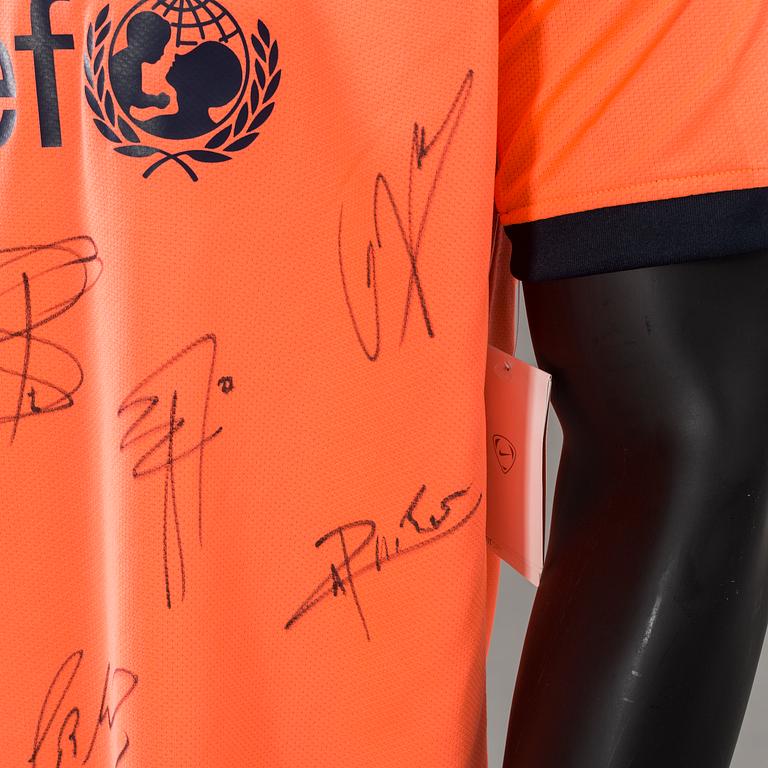 A ZLATAN IBRAHIMOVIC FC BARCELONA T-SHIRT WITH AUTOGRAPHES.