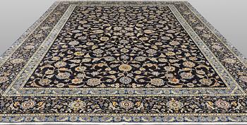 A Keshan carpet, approx. 440 x 308 cm.