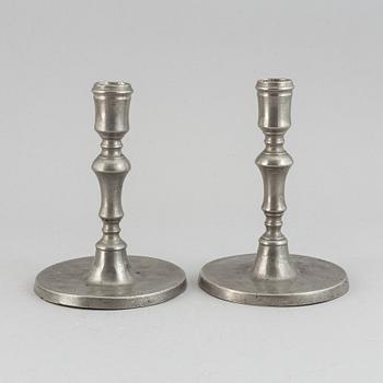 A pair of late baroque pewter candlesticks by Lars Lundwall Jönköpin.g.