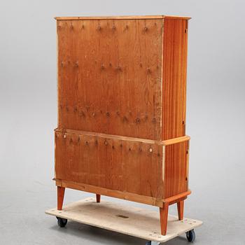A mahogany veneered cabinet, mid 20th Century.