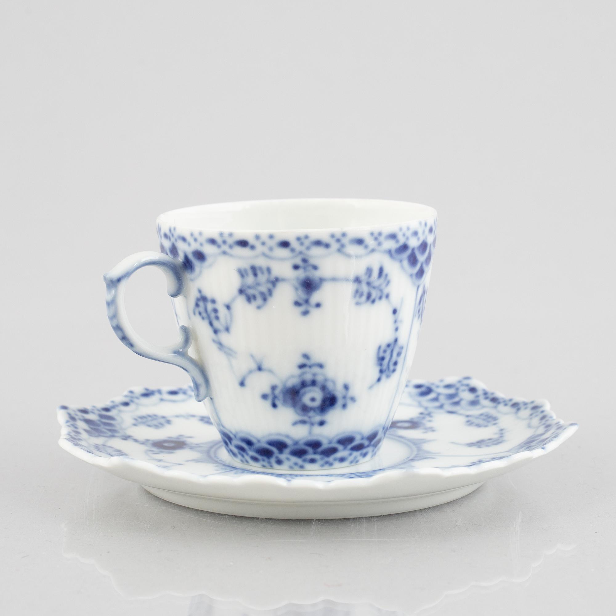 13 half lace "Musselmalet" porcelain coffee cups with saucers, Royal Copenhagen, Denmark.