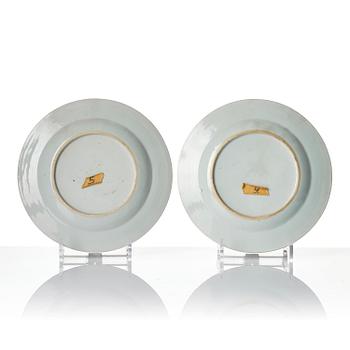 A famille rose serving dish and six dinner plates, Qing dynasty, Qianlong (1736-95).