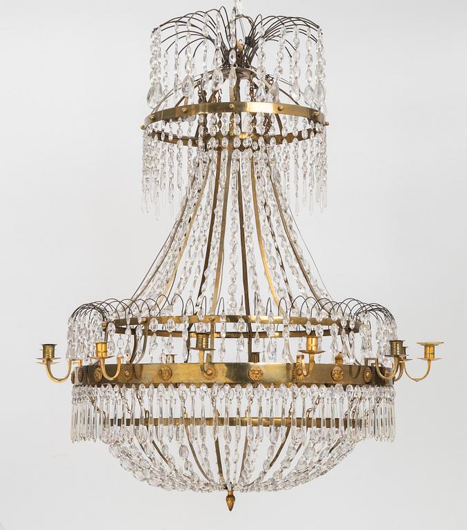 A late Gustavian early 19th Century twelve-light chandelier.