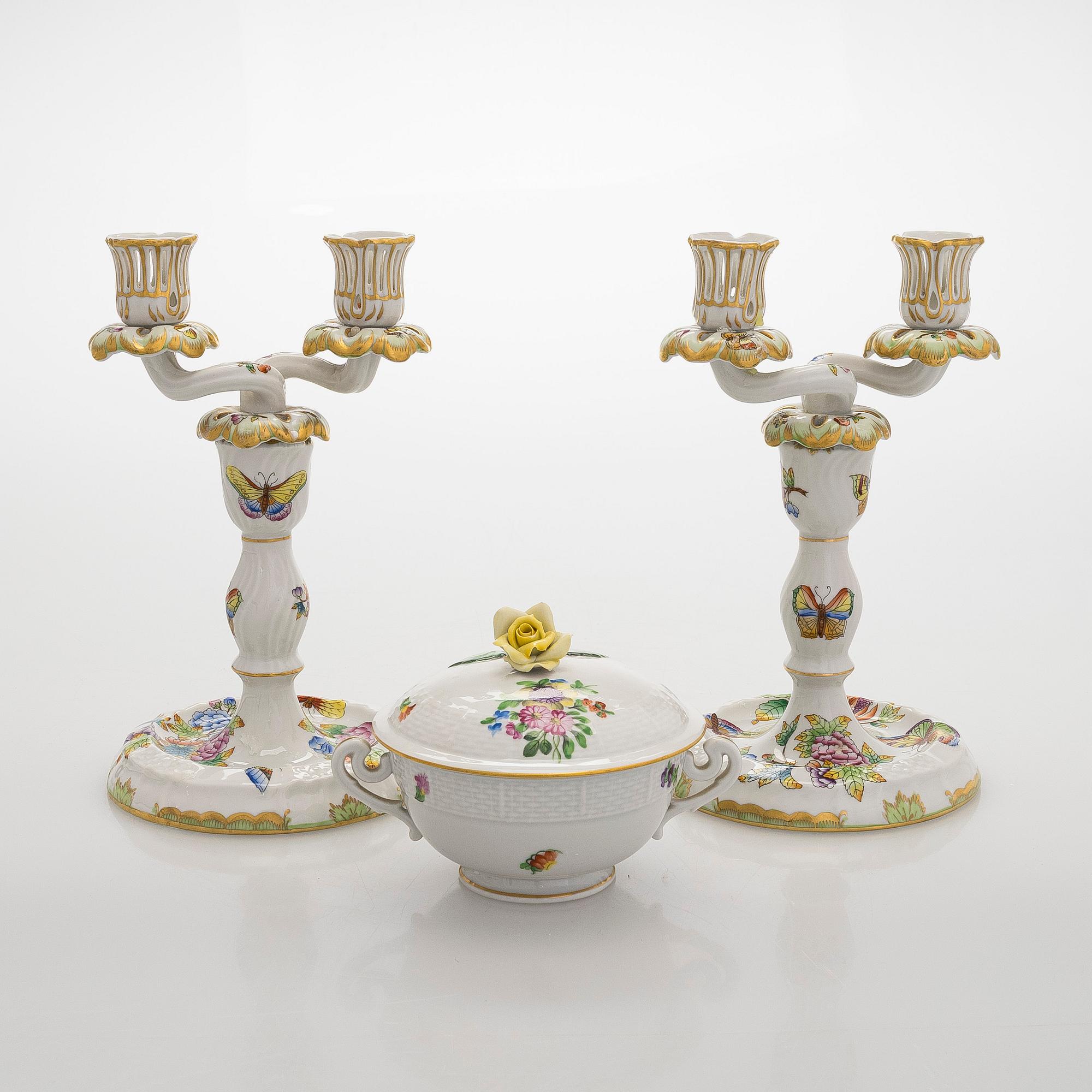 A pair of Herend porcelain candlesticks, and a lidded sugar bowl, Hungary.
