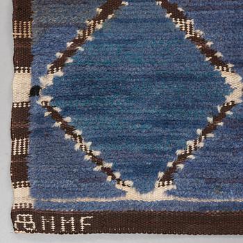 CARPET. "Snedrutan, blå". Knotted pile in relief. 306 x 200,5 cm. Signed AB MMF BN.