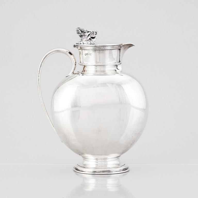 An English silver jug with lid, makers mark Hunt & Roskell Late Storr & Mortimer, London 1881.