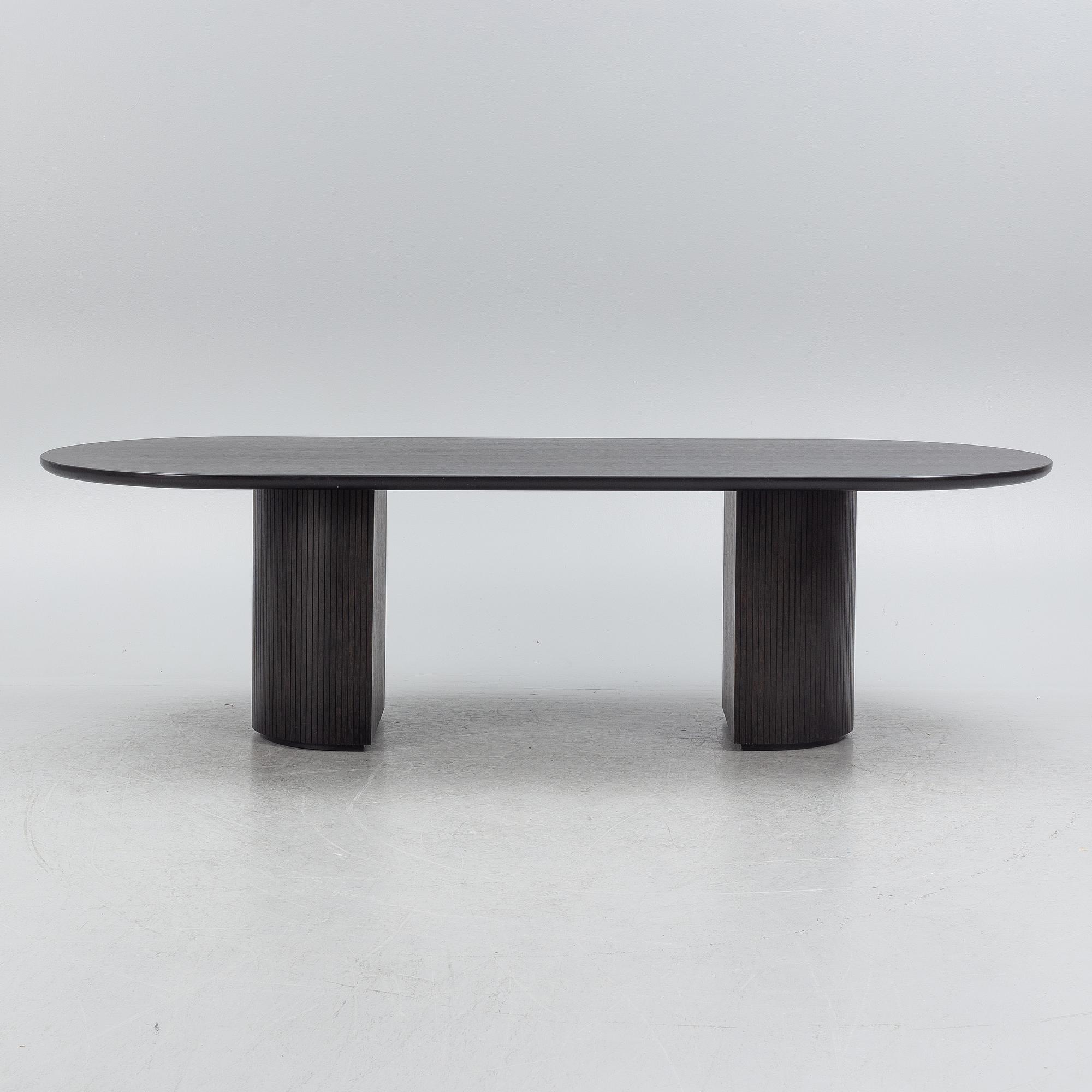 Space Copenhagen, a 'Moon' dining table, Gubi, Denmark.