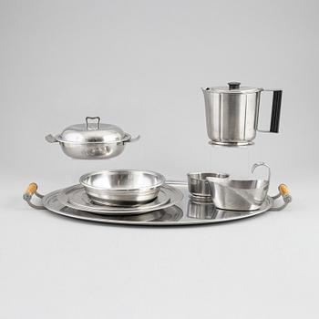 Eight stainless steal pieces to the 'Thebe' cutlry/dining service, Folke Arström, Gense, 1950's/60's.