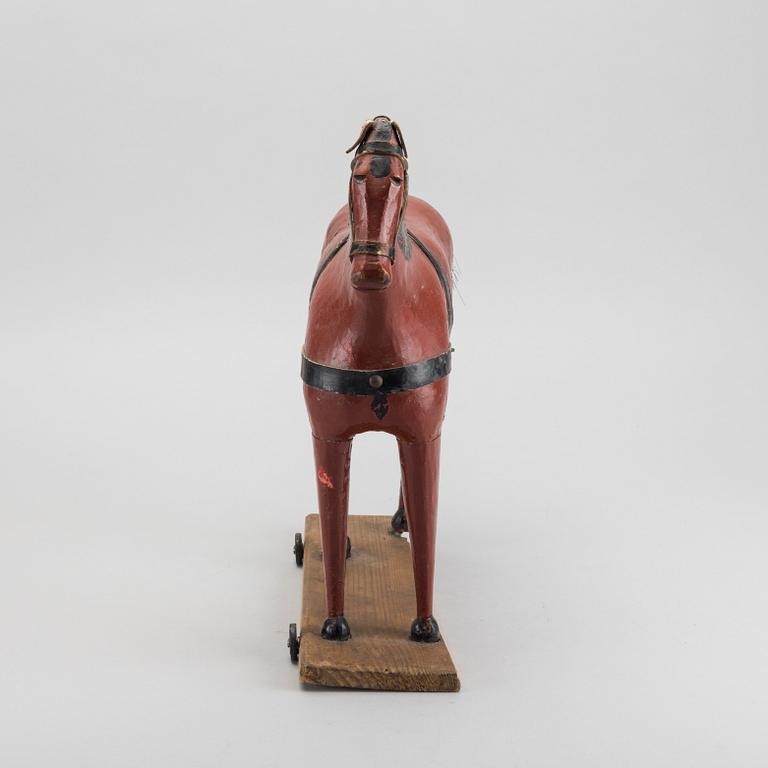 A toy wooden horse, late 19th cenury / turn of the century 1900.