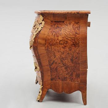 A burr-alder and gilt brass-mounted rococo commode by J. Sjölin (master 1767-1785).