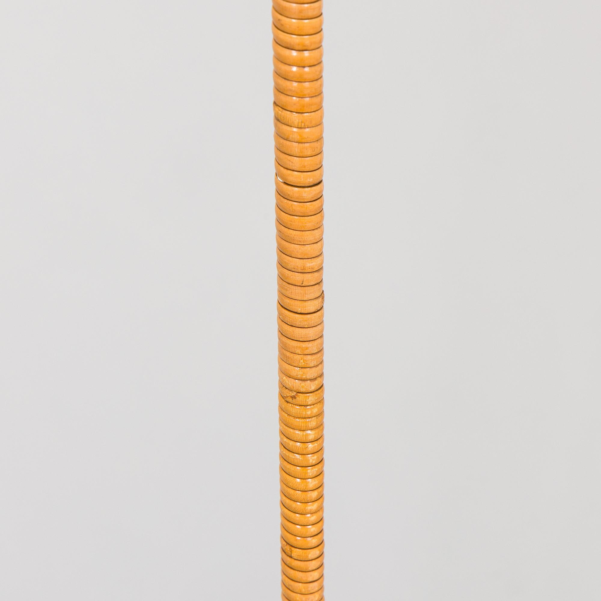 Paavo Tynell, a pair of mid-20th century K10-10 floor lamps for Taito Finland.