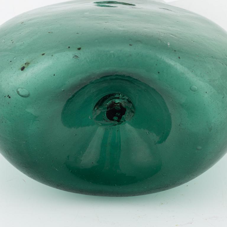 A green glass bottle, 18th/19th Century.