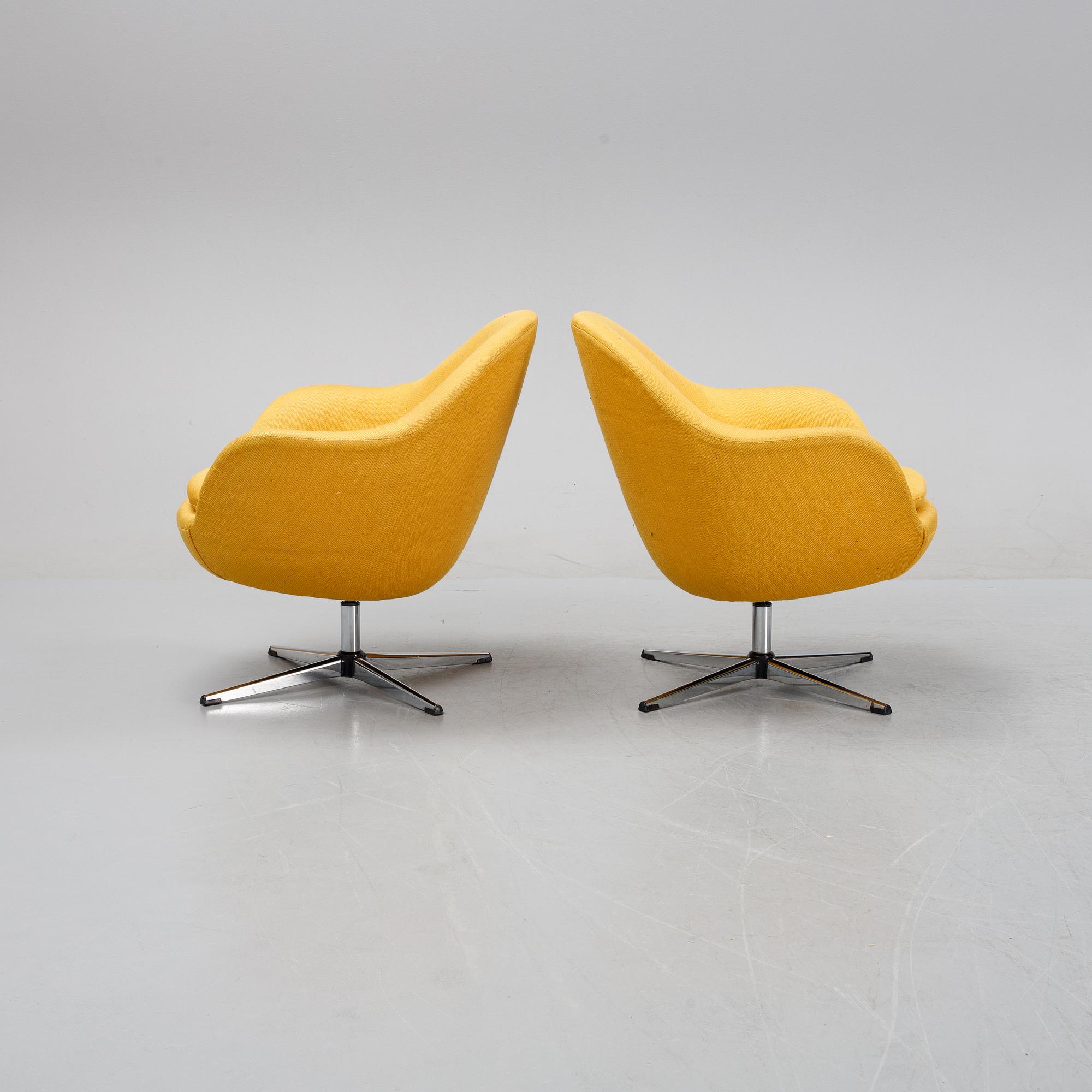 A pair of easy chairs, mid 20th Century.