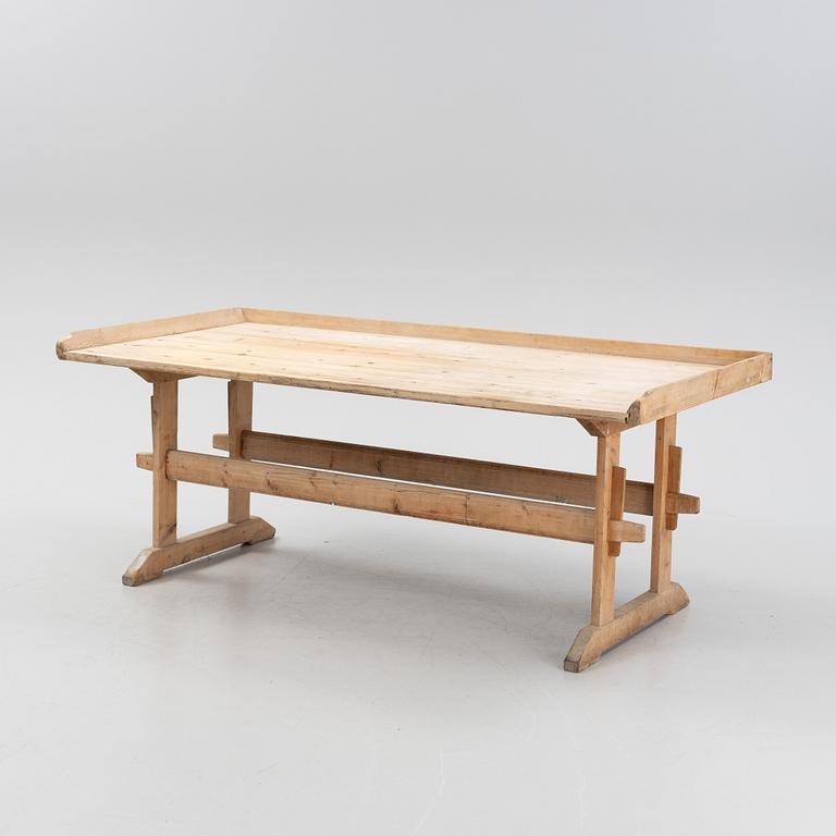 A pine baking table, 19th Century.