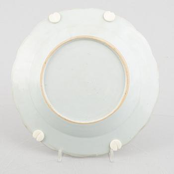 A group of three Chinese famille rose porcelain plates, Qing dynasty, Qianlong (1736-95).