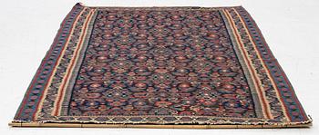 An antique Senneh kilim, West Persia, c. 149 x 11 cm.