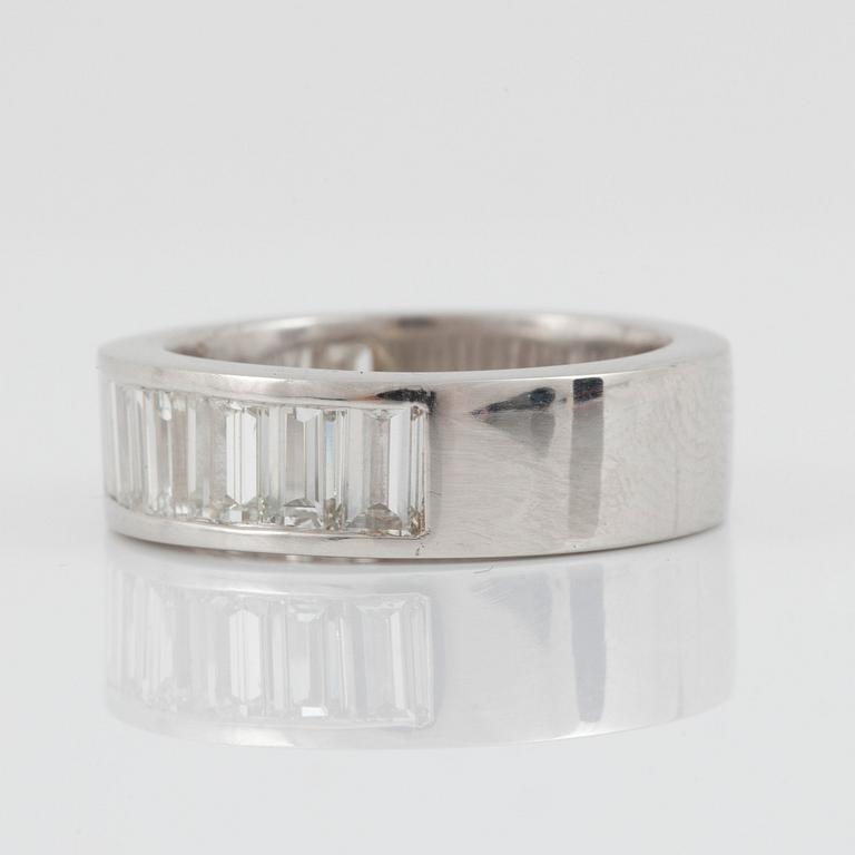 A baguette-cut diamond ring. Total carat weight circa 3.00 cts.