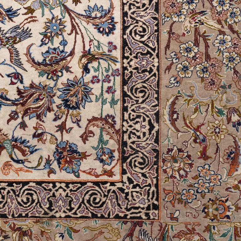 A signed pictoral Isfahan rug, Central Persia (Iran), signed, c. 235 x 154 cm.