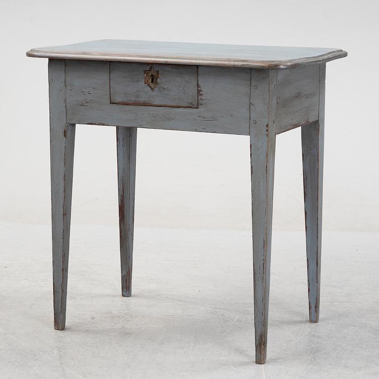 A painted table with a drawer, 19th Century.