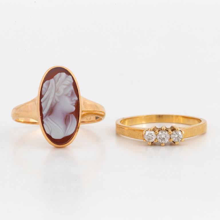 A brilliant cut diamnd ring and a cameo ring.