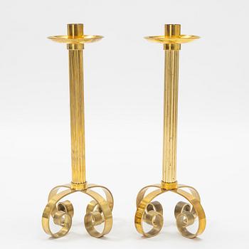 Ivar Ålenius-Björk, a pair of brass candle holders, Ystad Metall.