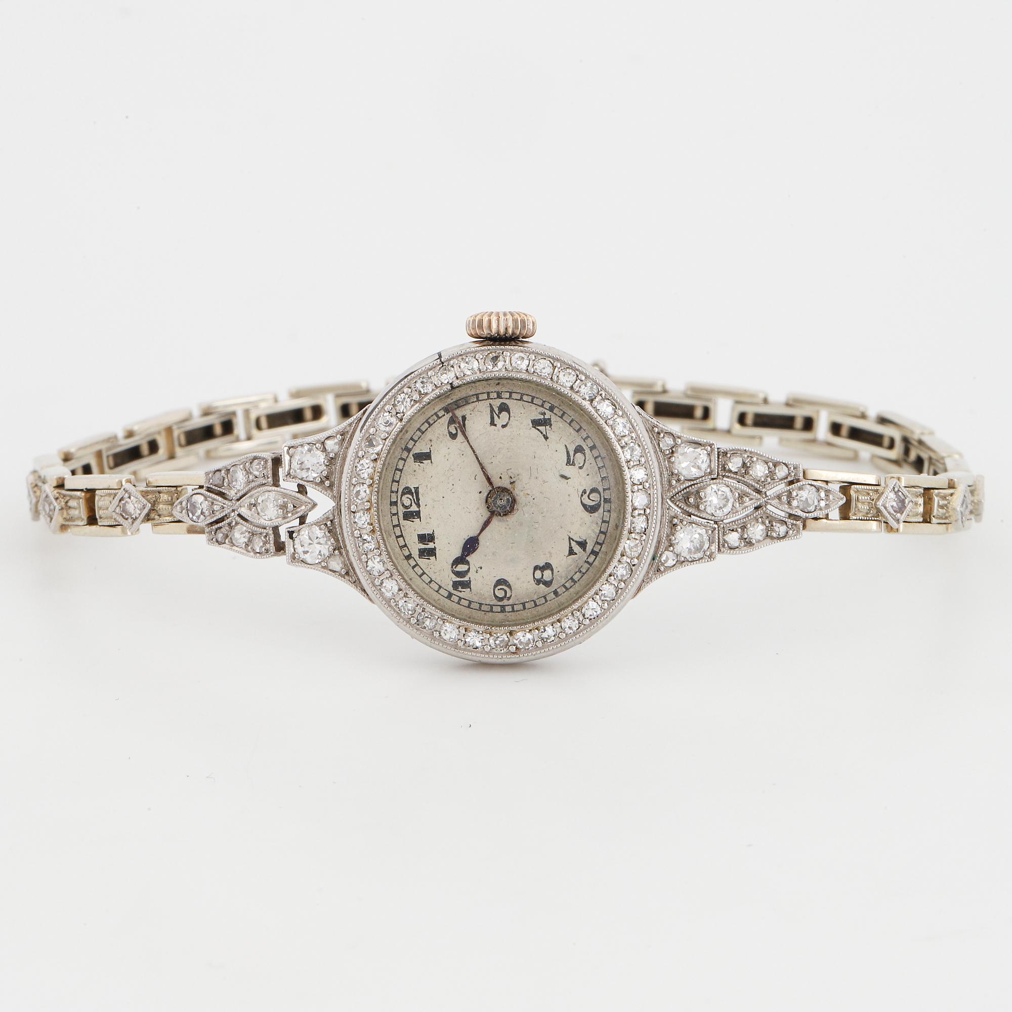 White gold and diamond ladies watch.